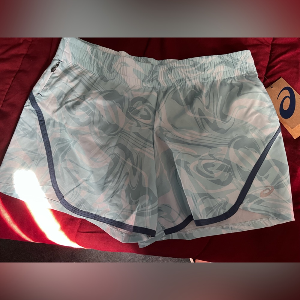 Asics size Small shorts. Light blue color